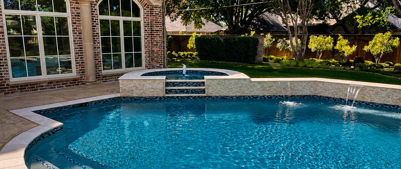 Remodeled pool with raised spa and bubbler jets